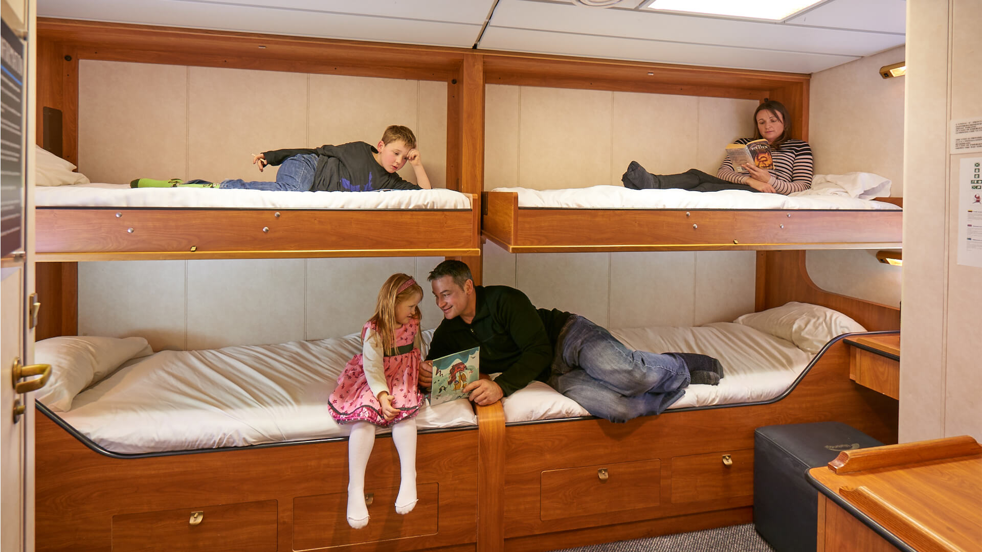Family relax in Bluebridge Ferry private cabin